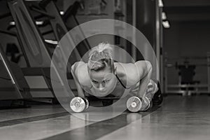 Woman push-ups on the floor