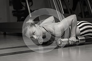 Woman push-ups on the floor