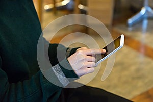 A woman Put fingers on the monbile phone