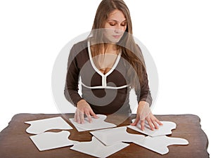 Woman with puzzle cards