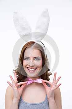 Woman in rabbit ears holding her butterfly