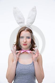 Woman in rabbit ears holding her butterfly