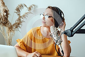 Woman radio host making podcast