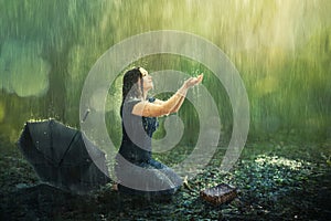 Woman and rain shower