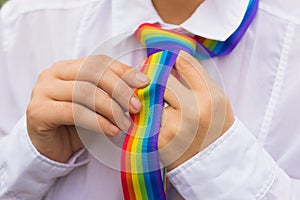 Woman with a rainbow tie