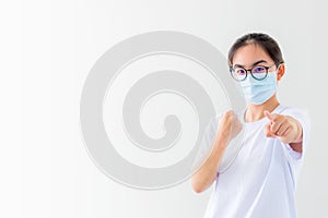 Woman raise fist and finger to show fighting