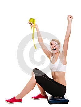 Woman raising her arms. Successful dieting slimming