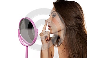 Woman raising her nose