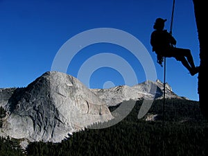 Woman rappelling photo