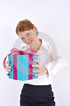 Woman reaching a gift box