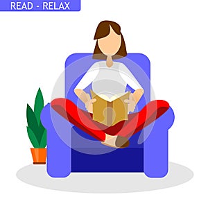 Woman read a book on armchair