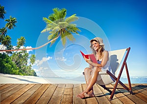 Woman Reading on a Beach