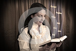 Woman reading a bible