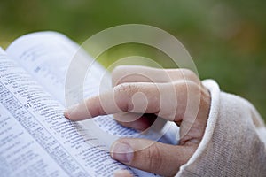 Woman Reading the Bible. photo