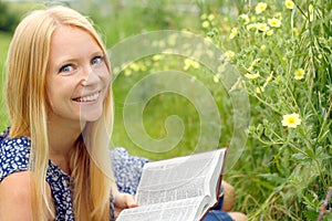 Woman Reading Bible Outside