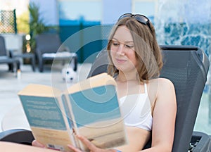 Woman reading a book.