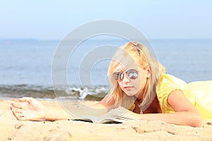 Woman reading book girl yellow dress