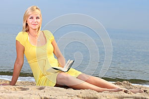 Woman reading book girl yellow dress