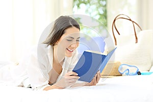 Woman reading a book on summer vacations