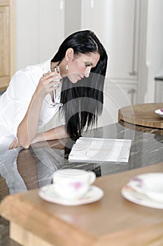 Woman reading a cookery book