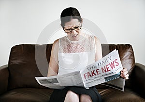 A woman reading fake news