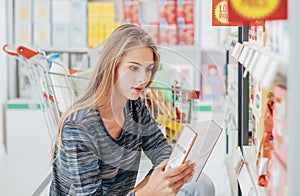 Woman reading food labels