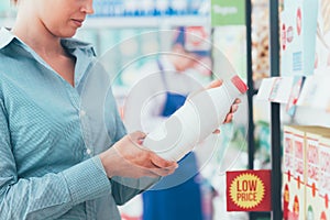 Woman reading food labels