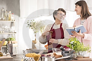 Woman reading grandmother recipes