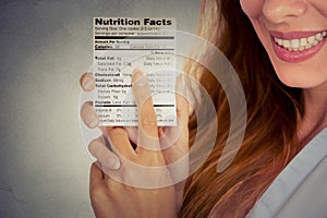 Woman reading healthy food nutrition facts