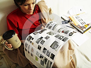 Woman is reading a new car booklet