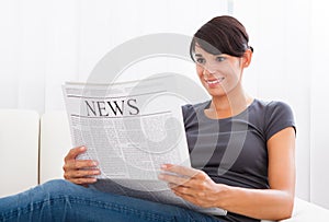 Woman Reading Newspaper