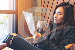 Woman reading newspaper