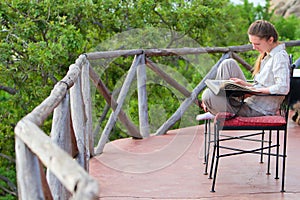 Woman reading outdoors