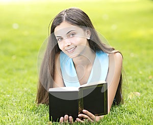 Woman reading outdoors