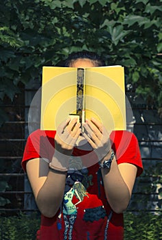 Woman reading outdoors