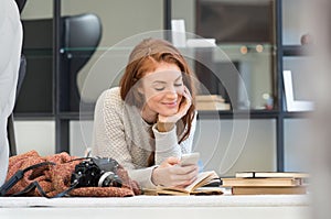 Woman reading a phone message