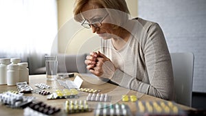 Woman reading prescription, side effect of medication, old age disease addiction