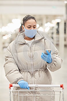 Woman reading shopping list