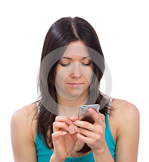 Woman reading typing texting sending SMS text message mobile