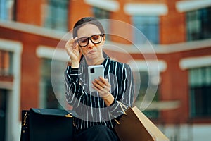 Woman Reading a Wired text message on her Phone