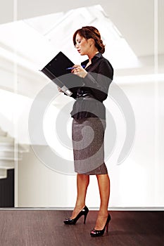 Woman reads documents