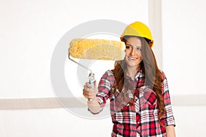 Woman ready to paint walls