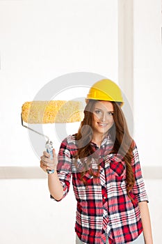 Woman ready to paint walls