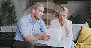 Woman realtor and male client discussing paper document agreement house rent or buying real estate