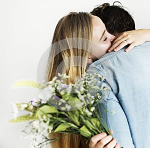 Woman receive a bouquet of flower from her lover