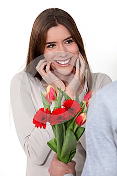 Woman receiving a bouquet