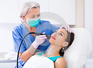 Woman receiving cryoliposuction