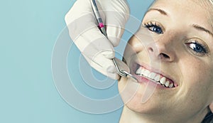 Woman receiving a dental check up from her dentist