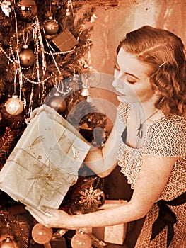 Woman receiving gifts. Black and white retro.