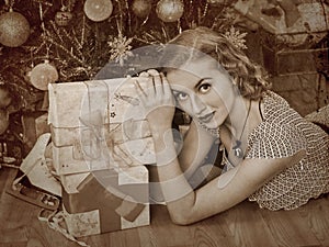 Woman receiving gifts. Sepia toned.